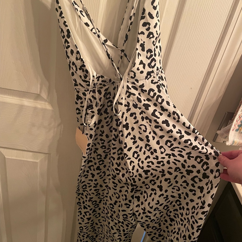 Super down jumpsuit size small tags on
